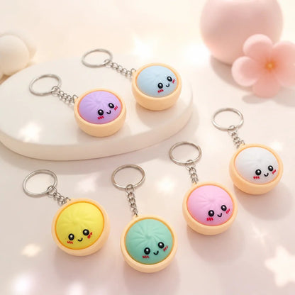🎁Cute Dumpling Pressable Fidget Keychain - touch sensing light
